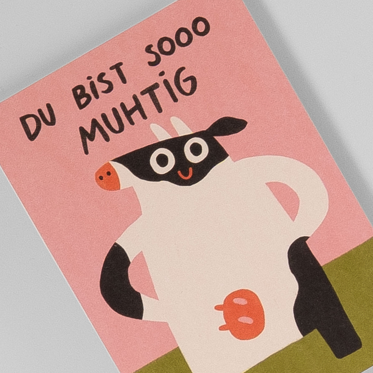 Detailansicht der Slinga Postkarte „Du bist sooo muhtig“